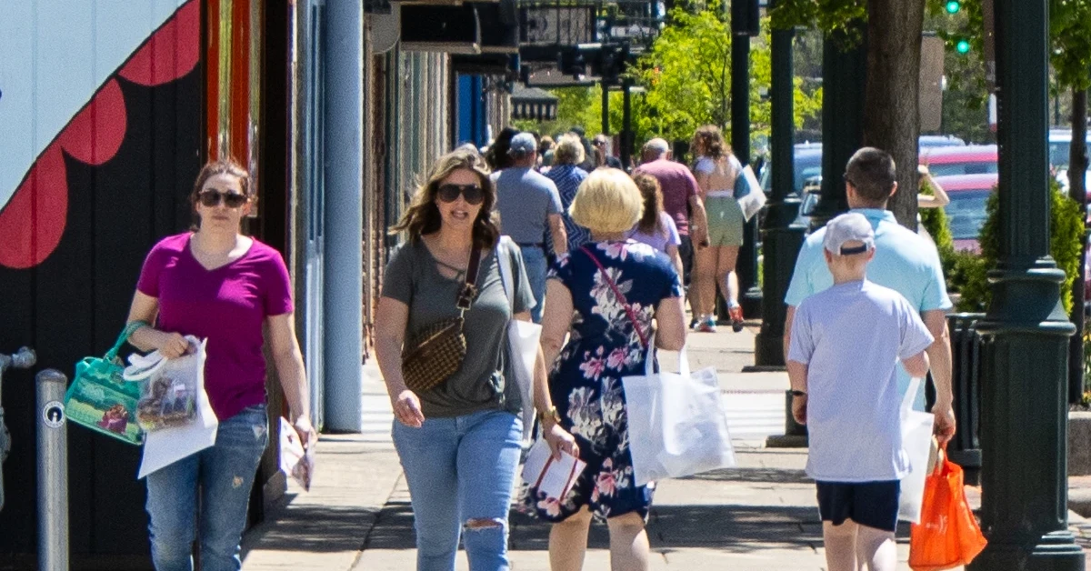 People walking down main street Bowling Green for Chocolate Crawl